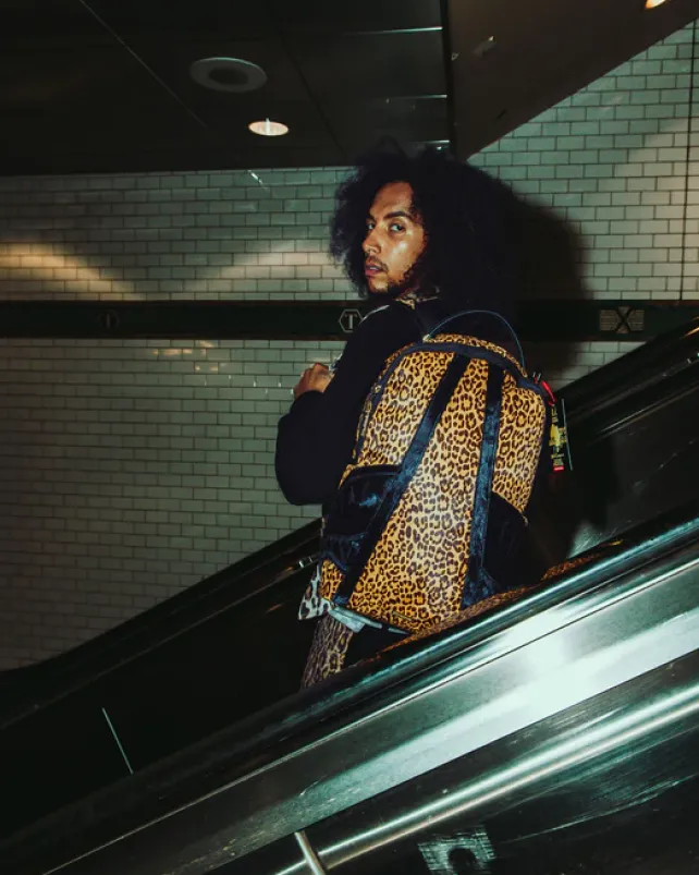 BACKPACKS>SPRAYGROUND AFRICAN INTELLIGENCE 9 COURAGE LIVES ON BACKPACK - SANDFLOWER COLLAB