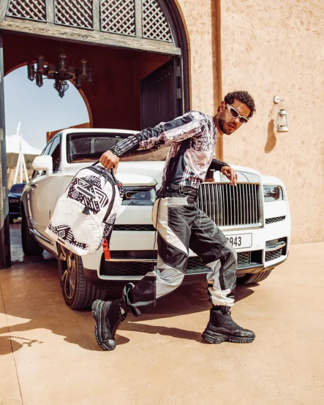 BACKPACKS>SPRAYGROUND A.I.8 AFRICAN INTELLIGENCE - ORIGIN STORY BACKPACK (DLXV)