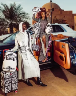 SLINGS|CROSSBODYS>SPRAYGROUND A.I.8 AFRICAN INTELLIGENCE - ORIGIN STORY BACKPACK SLING