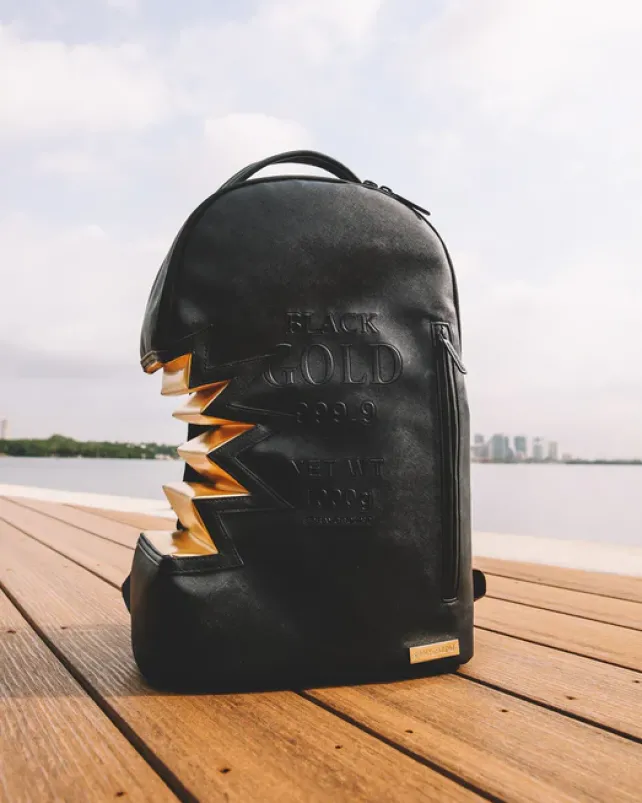 BACKPACKS>SPRAYGROUND A.i.3 SHARK BITE BLACK GOLD BACKPACK (DLXV)