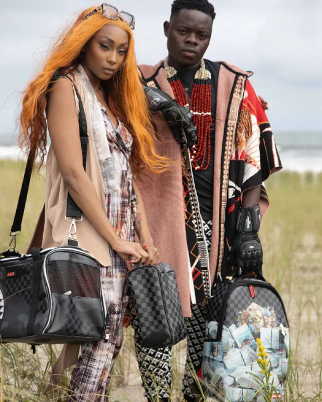 BACKPACKS>SPRAYGROUND BANK STACKS OF ZAMUNDA COMING 2 AMERICA BACKPACK