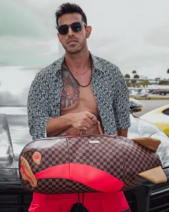 DUFFLES>SPRAYGROUND RACEWAY HENNY TORPEDO DUFFLE