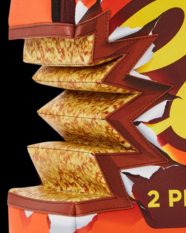 BACKPACKS>SPRAYGROUND REESE'S SHARK BITE BACKPACK (DLXV)