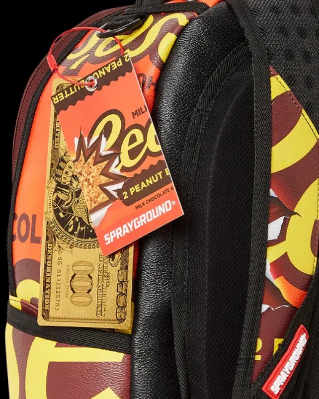 BACKPACKS>SPRAYGROUND REESE'S SHARK BITE BACKPACK (DLXV)