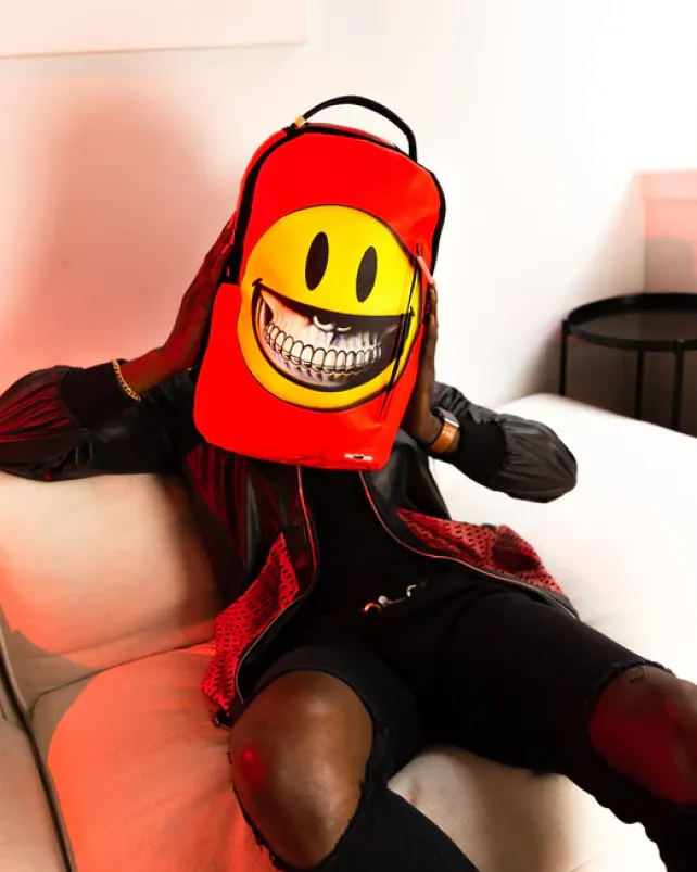 BACKPACKS>SPRAYGROUND SMILE BIG GRIN RON ENGLISH COLLAB