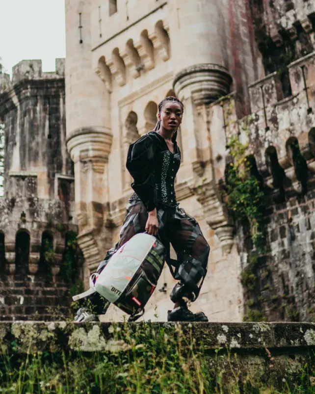 BACKPACKS>SPRAYGROUND SPLIT WEIRD BACKPACK (DLXV)
