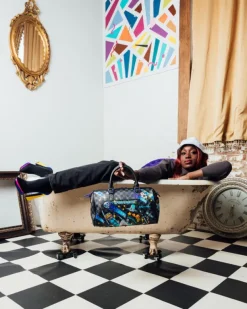 DUFFLES>SPRAYGROUND WTF ALIEN INVASION MINI DUFFLE