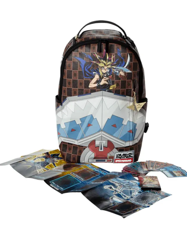 BACKPACKS>SPRAYGROUND YU GI OH DUAL DISK SHARK